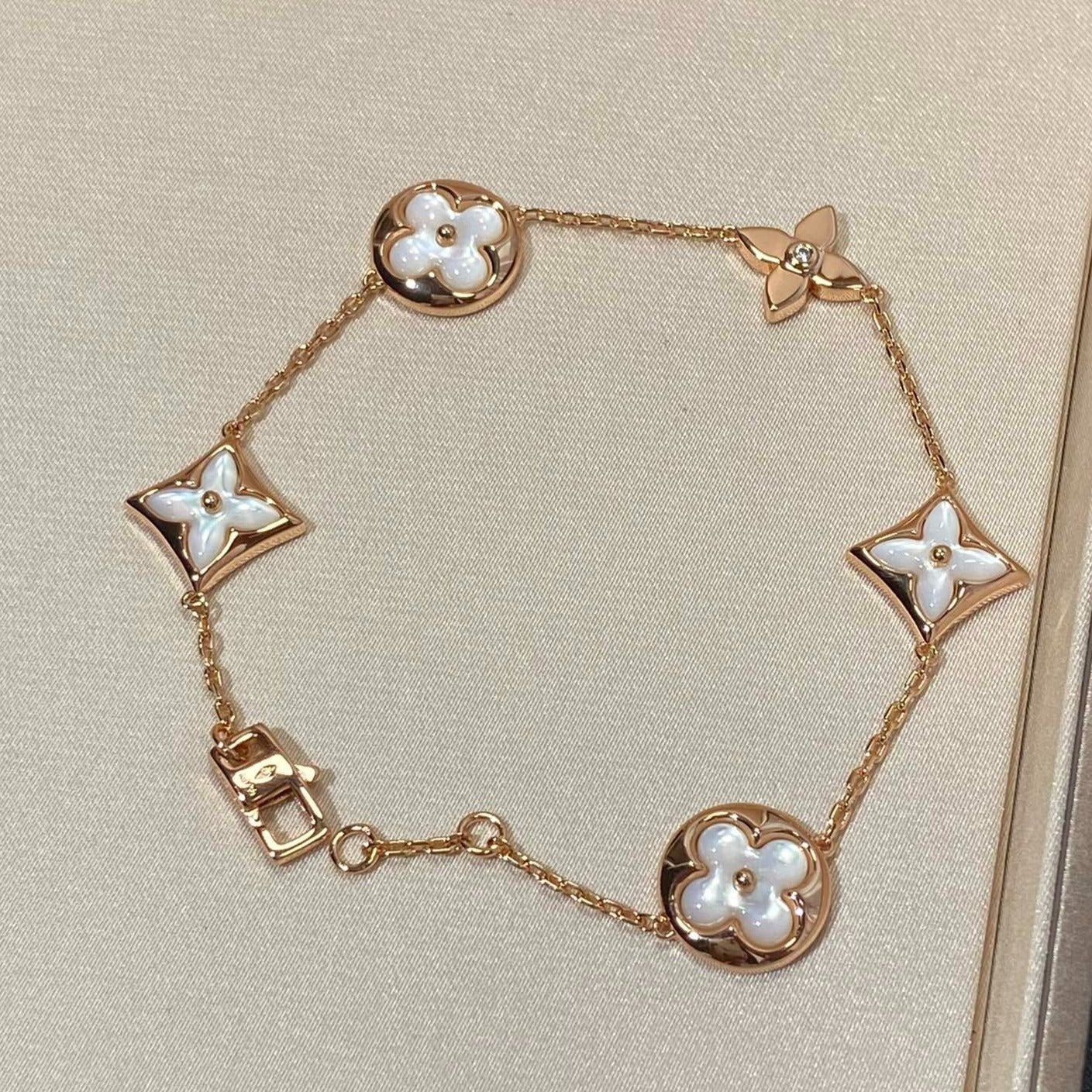 [Glitter Jewelry]STAR AND SUN 5 MOTIF MOP PINK GOLD BRACELET