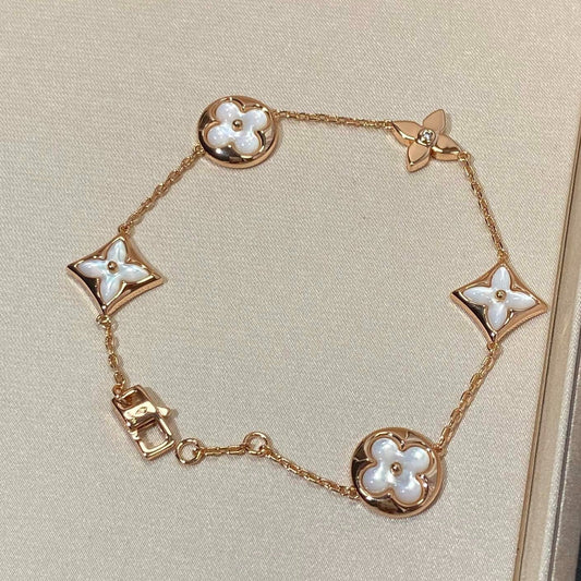 [Glitter Jewelry]STAR AND SUN 5 MOTIF MOP PINK GOLD BRACELET