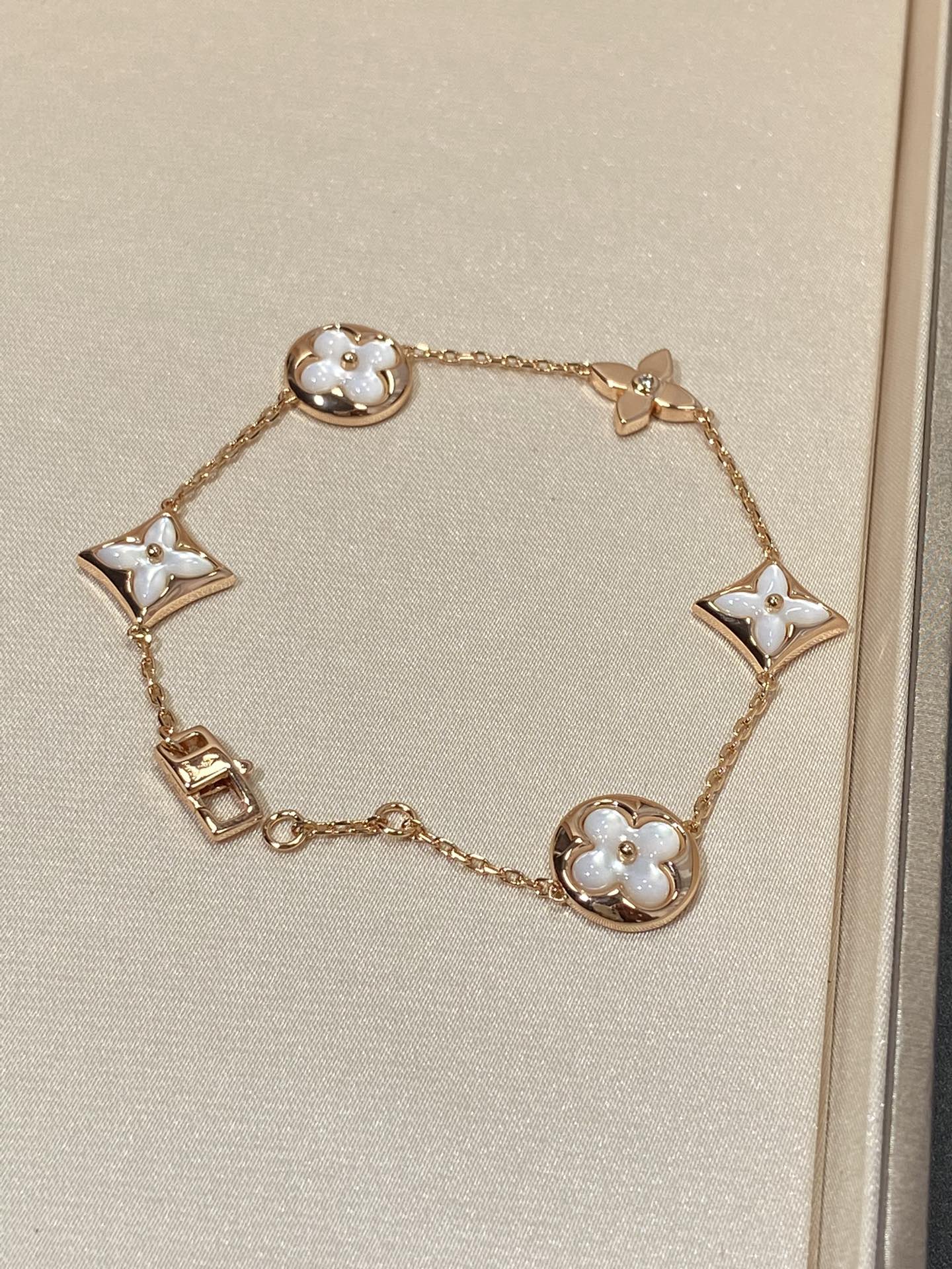 [Glitter Jewelry]STAR AND SUN 5 MOTIF MOP PINK GOLD BRACELET