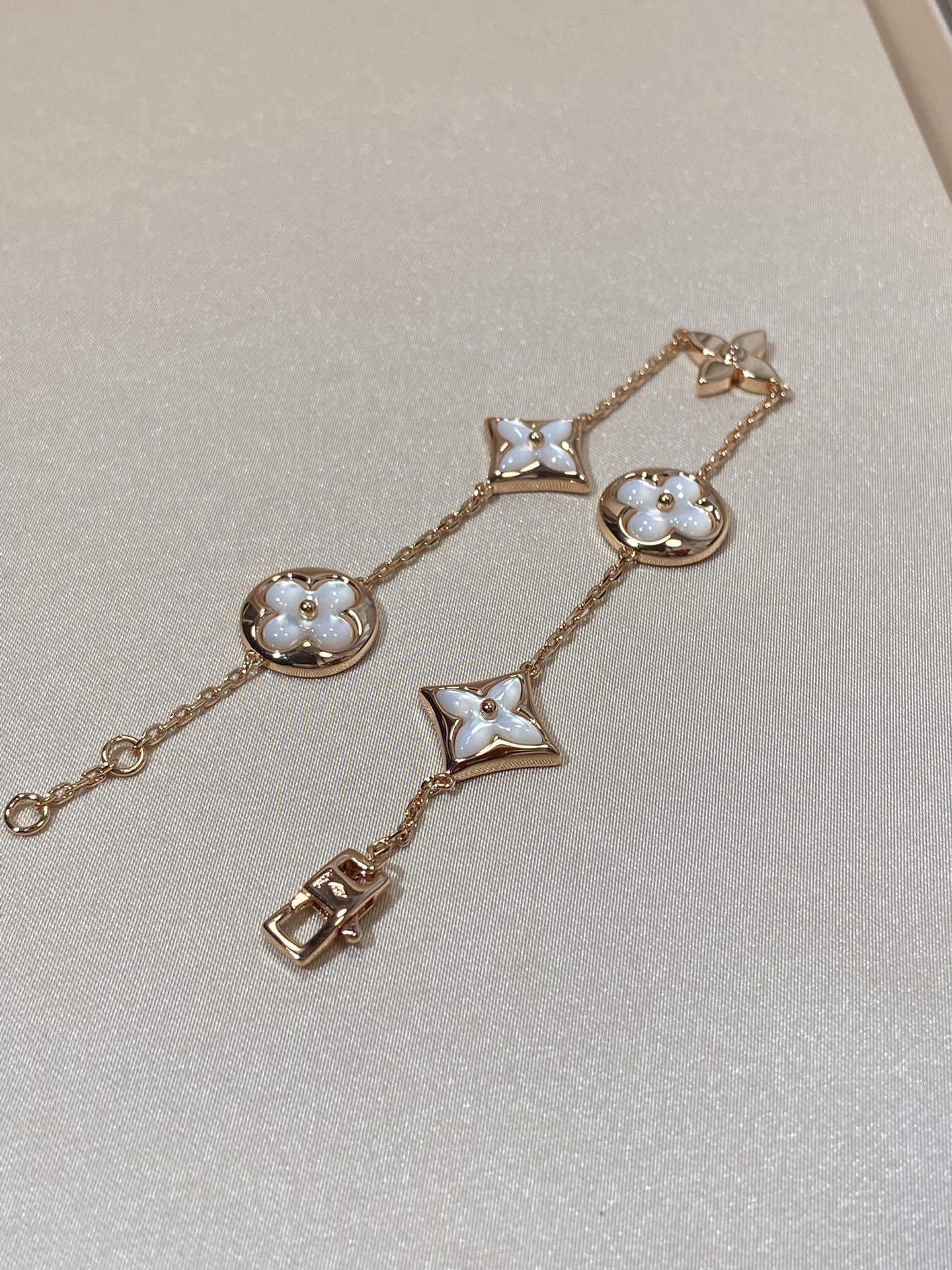 [Glitter Jewelry]STAR AND SUN 5 MOTIF MOP PINK GOLD BRACELET