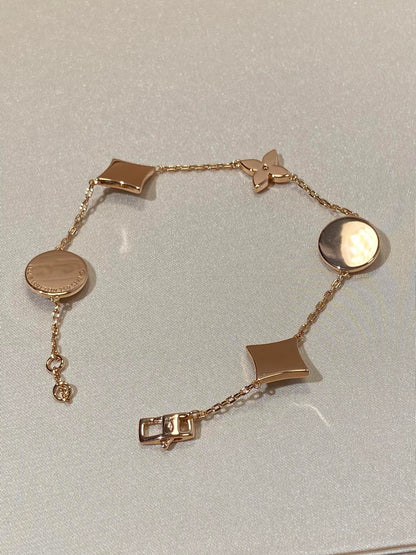 [Glitter Jewelry]STAR AND SUN 5 MOTIF MOP PINK GOLD BRACELET