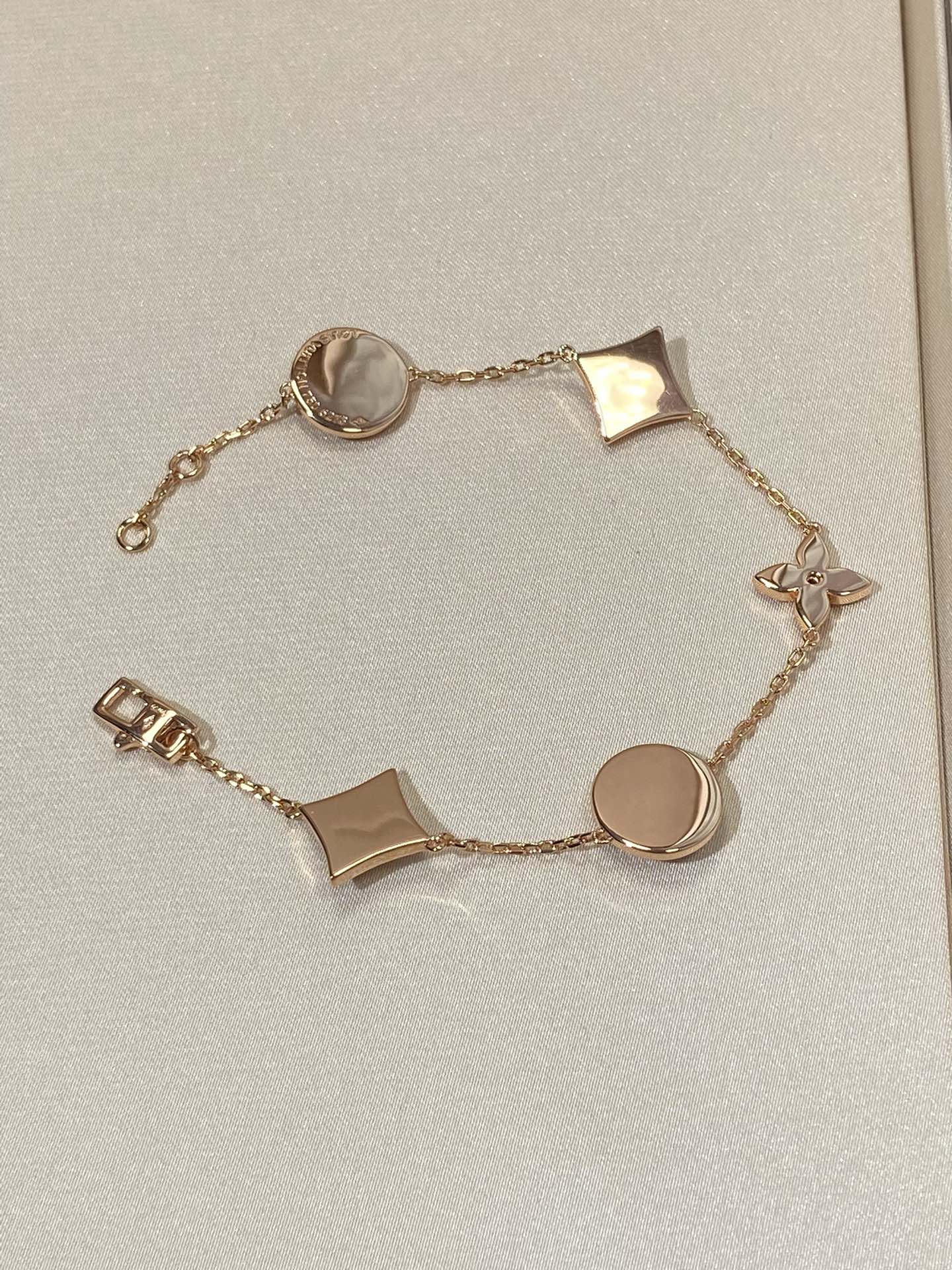 [Glitter Jewelry]STAR AND SUN 5 MOTIF MOP PINK GOLD BRACELET