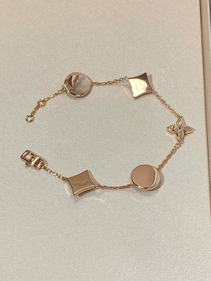 [Glitter Jewelry]STAR AND SUN 5 MOTIF MOP PINK GOLD BRACELET