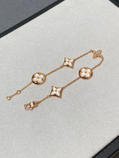 [Glitter Jewelry]STAR AND SUN 5 MOTIF MOP PINK GOLD BRACELET