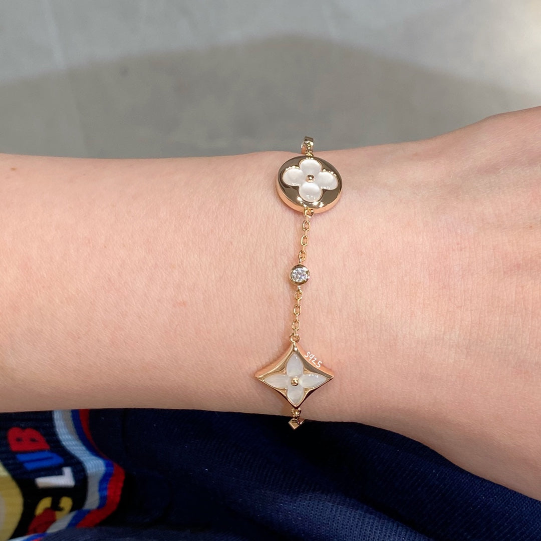 [Glitter Jewelry]STAR AND SUN 4 MOTIF WHITE MOP PINK GOLD BRACELET