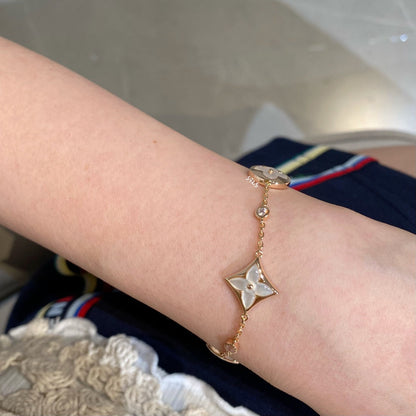 [Glitter Jewelry]STAR AND SUN 4 MOTIF WHITE MOP PINK GOLD BRACELET