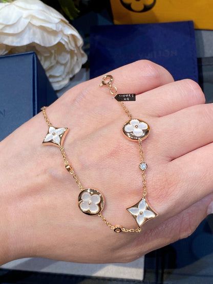 [Glitter Jewelry]STAR AND SUN 4 MOTIF WHITE MOP PINK GOLD BRACELET